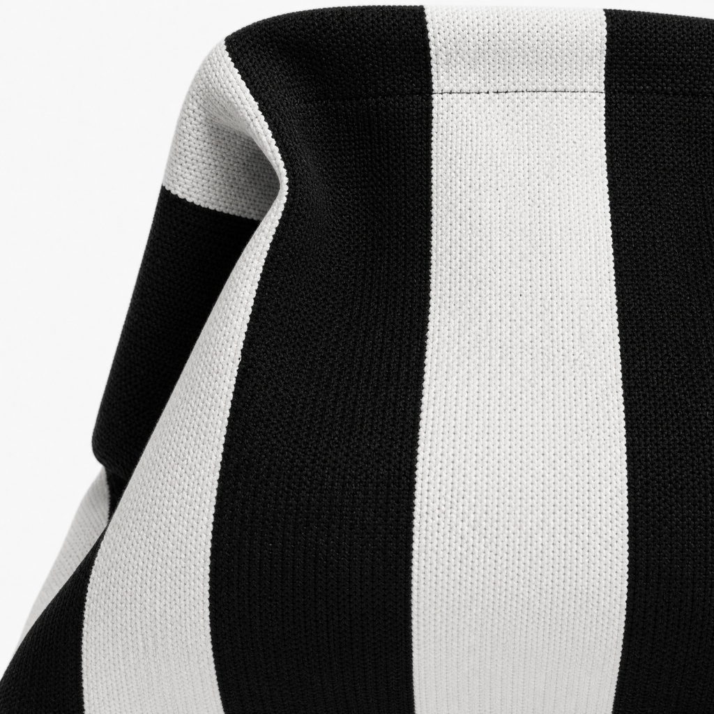 Stylish black and white striped machine washable everywhere clutch fabric close-up, perfect for all occasions.